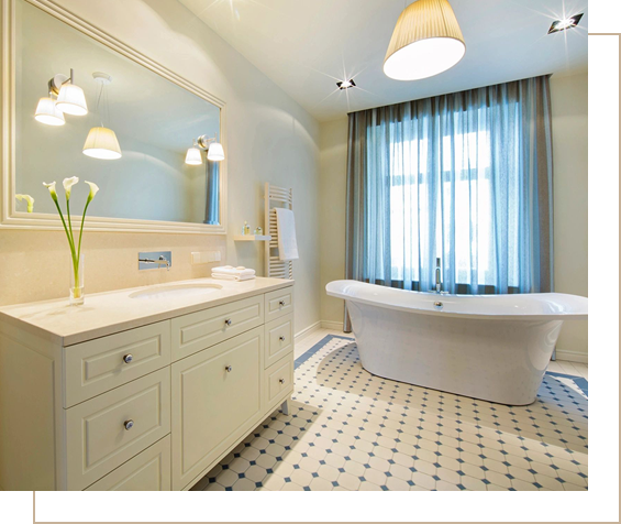 Bathrooms tastefully decorated with bath, wash basin, mirror and shelves in light colors.